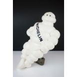 Advertising - Michelin Man plastic figure seated on a metal support, approx 37cm high