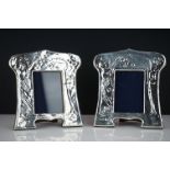 Matching pair of silver photo frames with embossed decoration