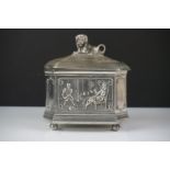 A.E. Williams pewter tea caddy of octagonal form with relief panel decoration depicting a tavern