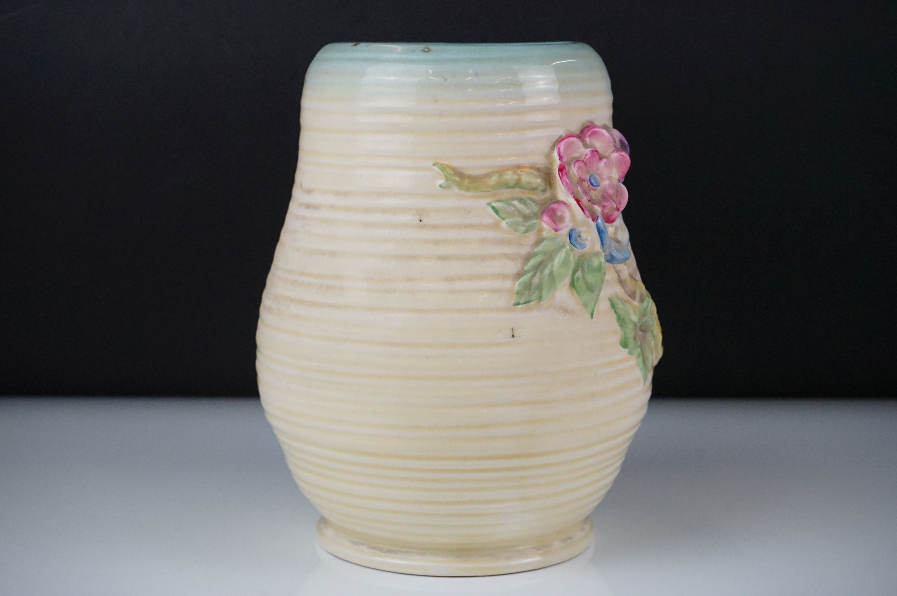 Clarice Cliff Newport Pottery vase of baluster form, with polychrome moulded blossom decoration on a - Image 2 of 7