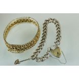 A silver charm bracelet together with a silver gilt bangle.