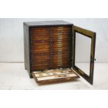 Late 19th / Early 20th century painted wooden microscope slide cabinet, the glazed door opening to