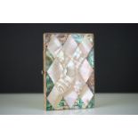 An early 20th century mother of pearl and Paua / Abalone shell decorated card case.