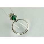 Silver magnifying glass pendant necklace set with malachite cabochon