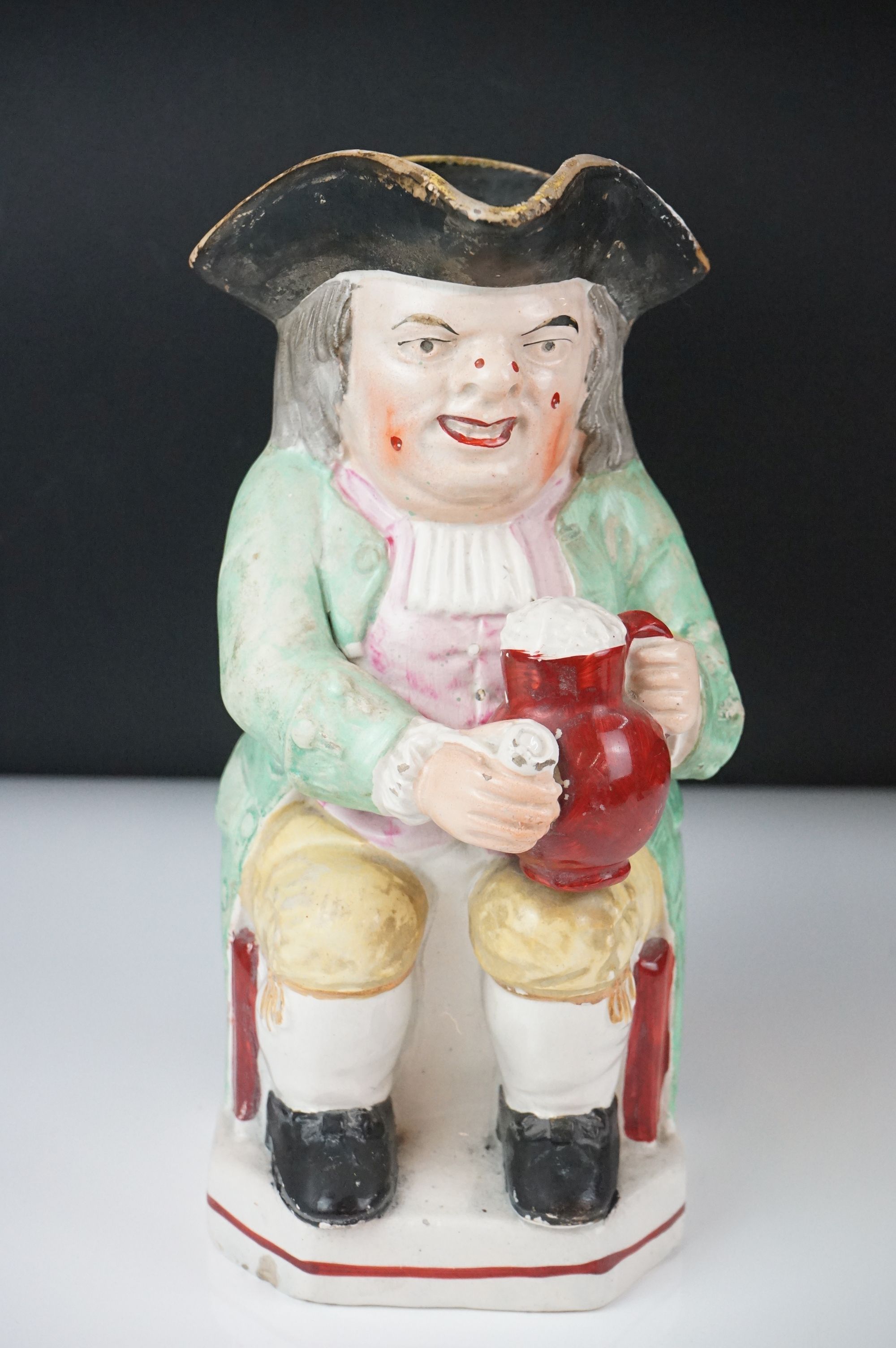 19th Century Staffordshire Toby jug modelled as Toby Philpott holding a foaming tankard and pipe, - Image 2 of 14