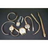 A small collection of ladies and gents vintage wristwatches to include a 9ct gold cased example.