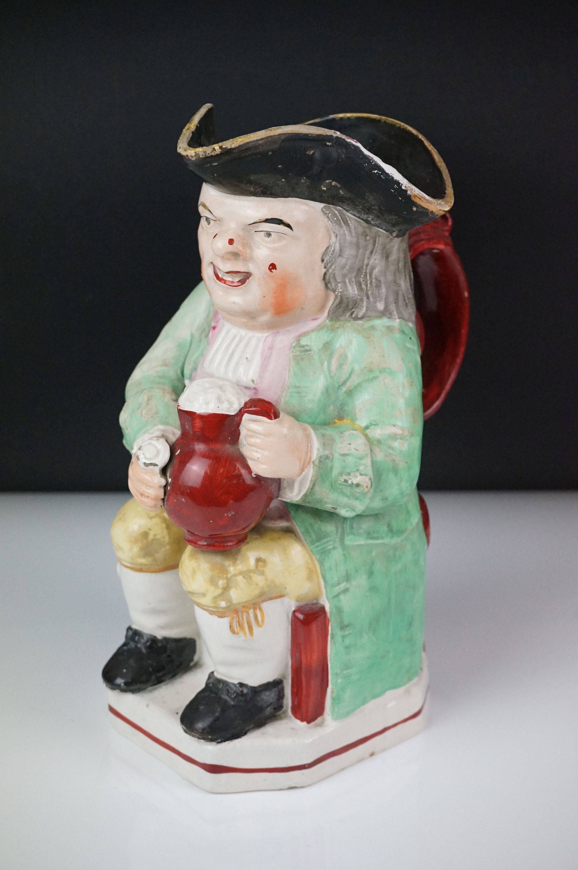 19th Century Staffordshire Toby jug modelled as Toby Philpott holding a foaming tankard and pipe, - Image 6 of 14