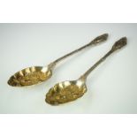 Pair of silver plated berry spoons with gilded bowls