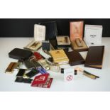 A collection of mainly vintage pocket cigarette lighters to include Dunhill and Calibri examples.