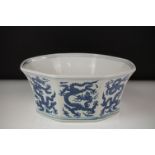Chinese Porcelain Octagonal Blue and White Bowl decorated with dragons, four character marks to