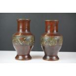 Pair of late 19th Century Japanese enamelled cloisonné vases of baluster form, with bird and foliate