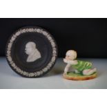 A Royal Worcester porcelain figure 'Michael' by F G Doughty, No 2912, together with a Wedgwood black