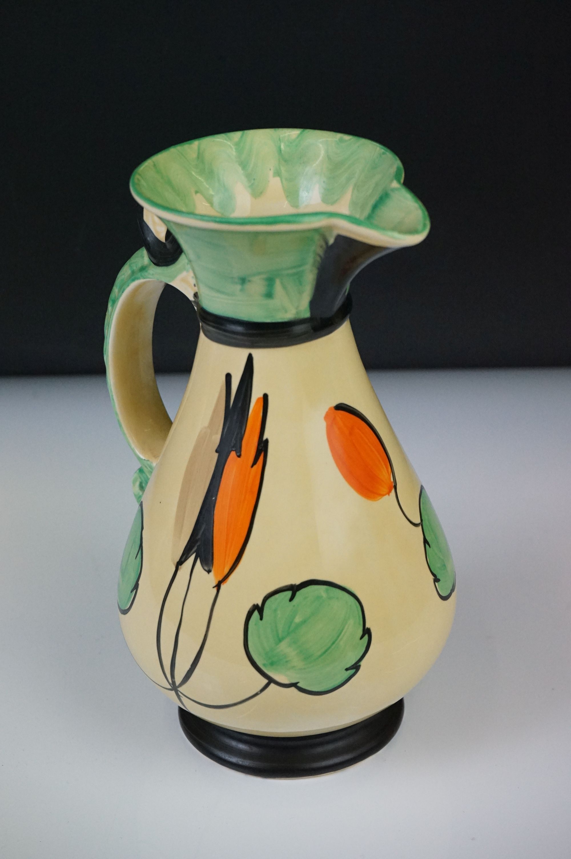 Four Myott, Son & Co hand painted Art Deco footed jugs, decorated with colourful floral, foliate and - Image 11 of 21