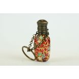 Late 19th century cranberry glass scent bottle with finger chain, circa 1880, with hand painted