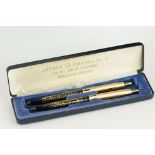 Pair of advertising Chanel No.5 Arpege ball point pens, in original box Provenance: from the private