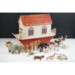Vintage wooden painted Noah's Ark with a quantity of carved wooden animals to include swans, pigs,