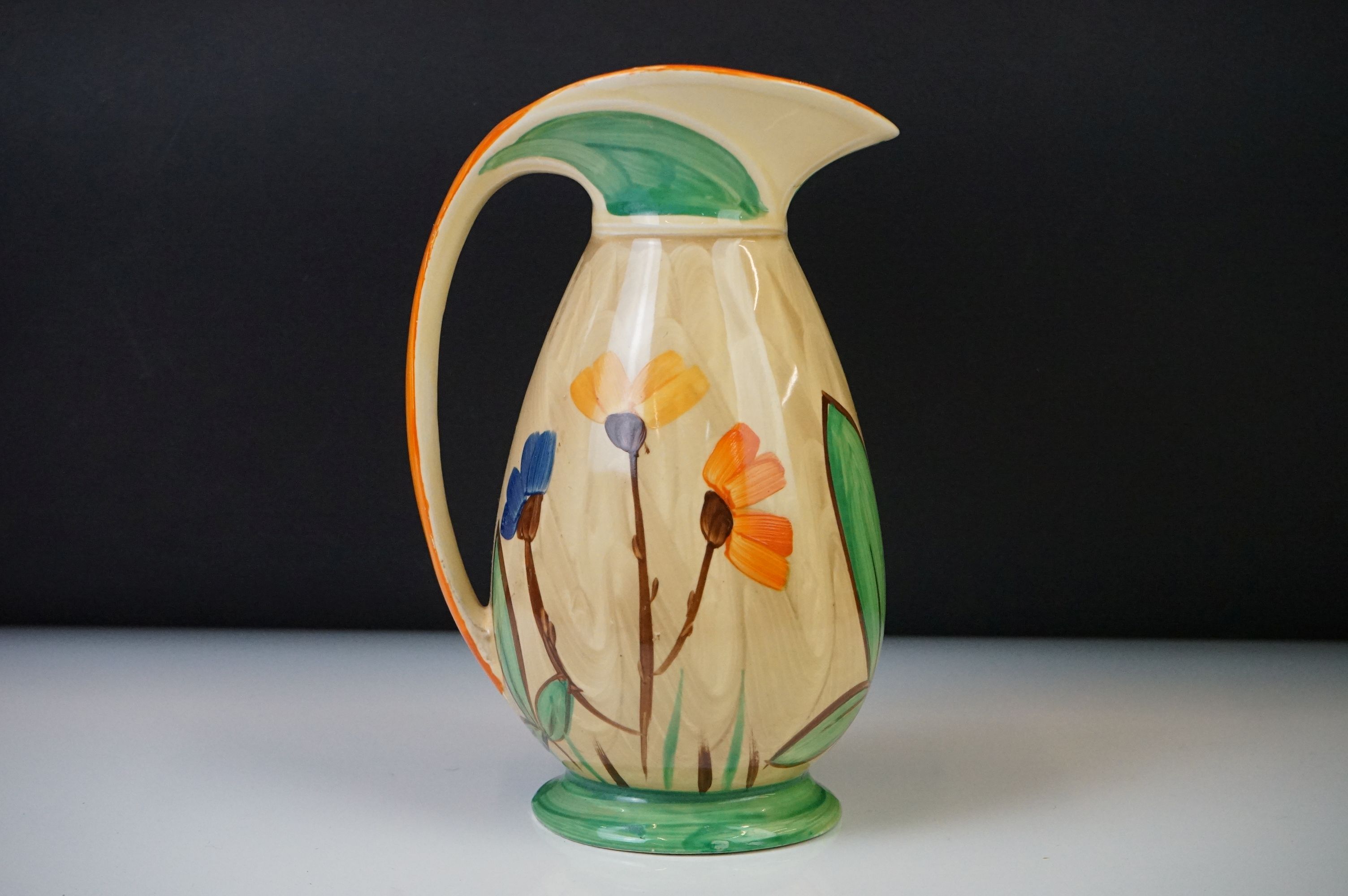 Four Myott, Son & Co hand painted Art Deco footed jugs, decorated with colourful floral, foliate and - Image 15 of 21