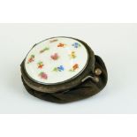 Enamelled compact of material purse form, white guilloche enamel with hand painted floral decoration