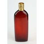 18th century French lay down ruby glass scent bottle, plain polished tapered body, the yellow and