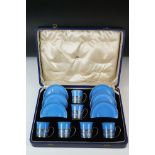 Boxed Shelley Blue glazed coffee set to include six coffee cans in silver hallmarked handled
