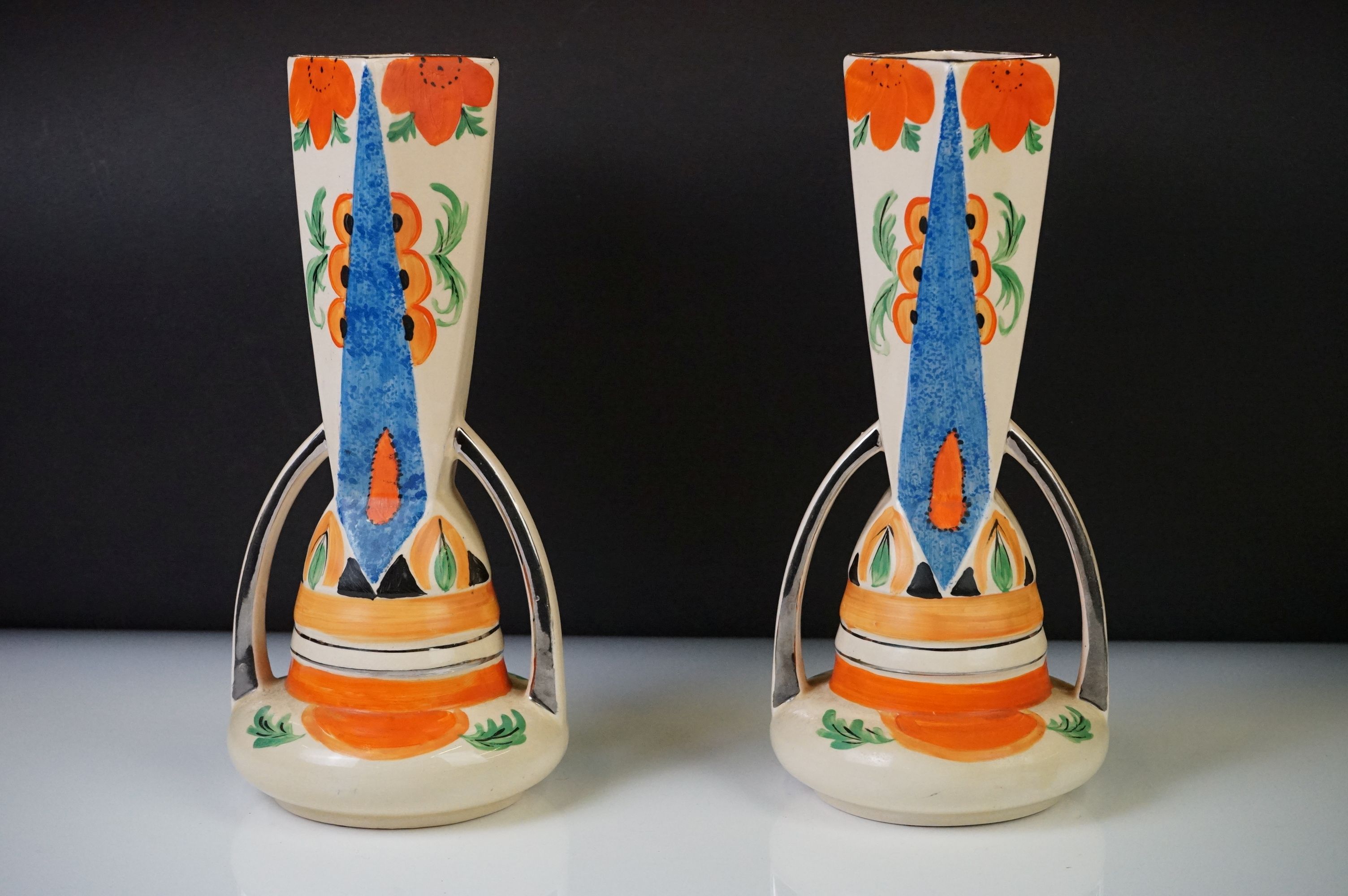 Four Myott, Son & Co hand painted Art Deco footed jugs, decorated with colourful floral, foliate and - Image 18 of 21