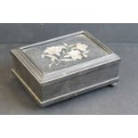 An Italian "Grand Tour" ebony casket, the lid insert with a rectangular pietra dura floral panel,