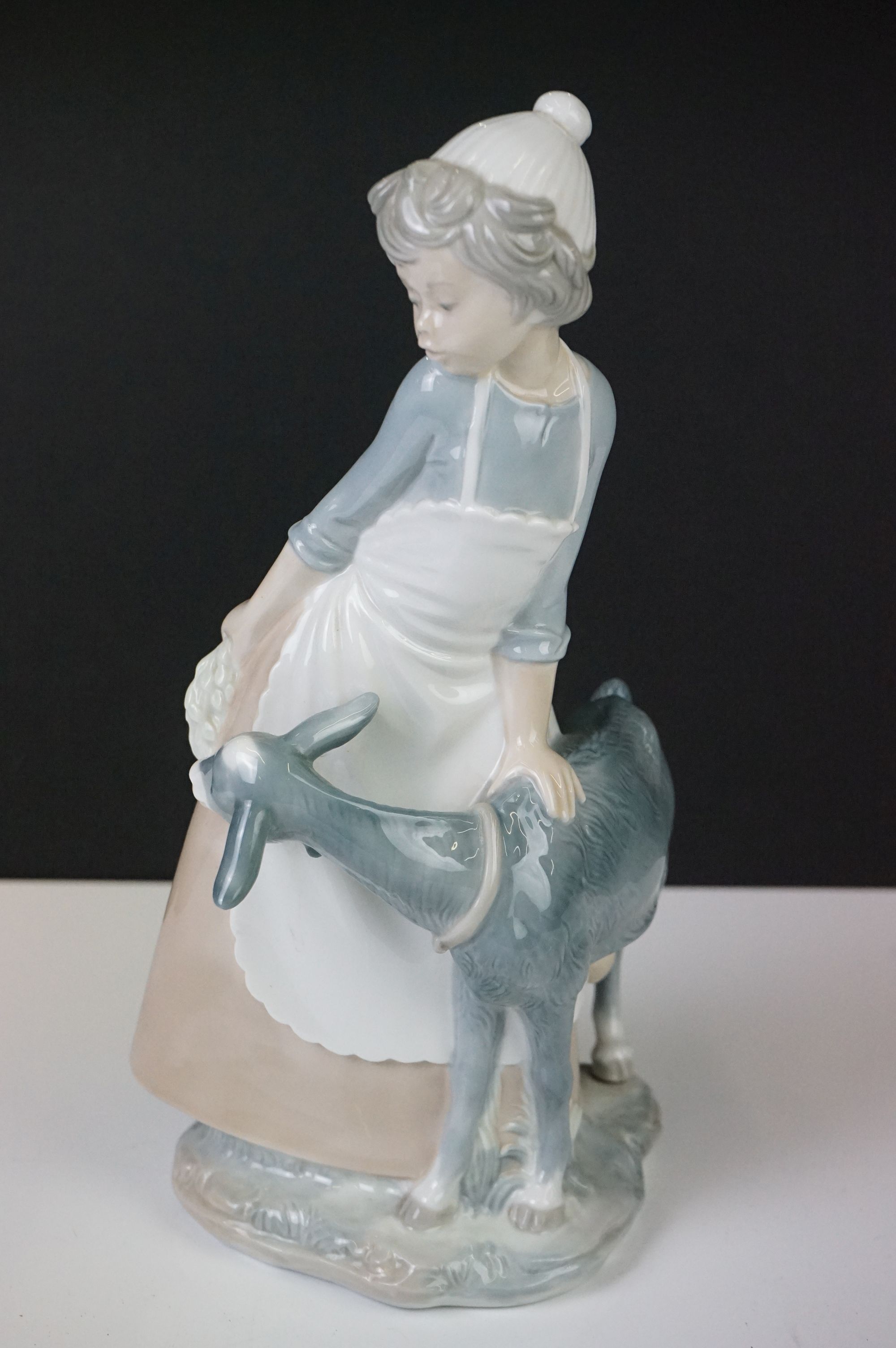 Six Nao by Lladro porcelain figures to include a girl with a goat (29.5cm high), a tailor and a - Image 7 of 7