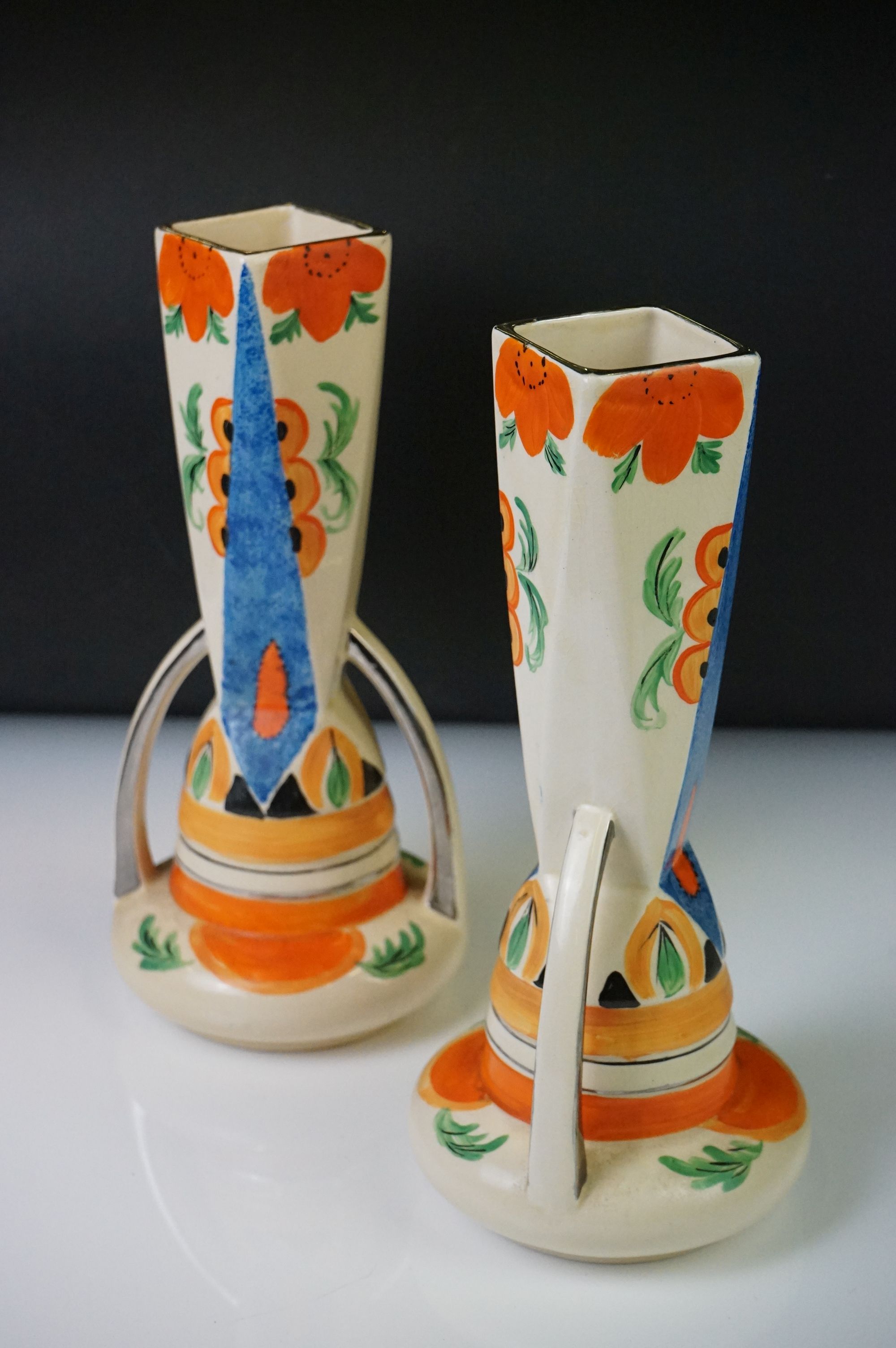 Four Myott, Son & Co hand painted Art Deco footed jugs, decorated with colourful floral, foliate and - Image 19 of 21