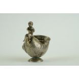 19th century silver open salt cellar modelled as a footed shell with putti figure, import letter '