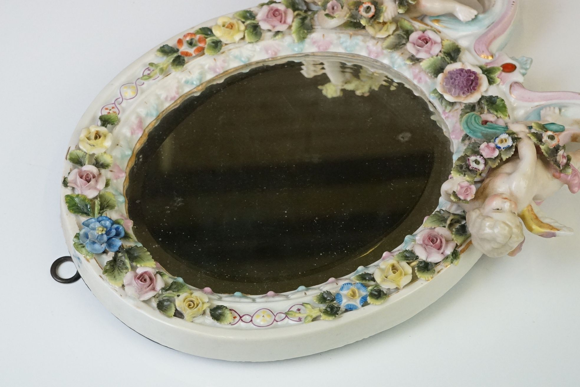 Dresden porcelain dressing table mirror of oval form, with bevel glass surmounted by two cherubs - Image 5 of 7