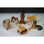 Six Beswick porcelain dog figures to include a Bosun Bulldog (1731), Labrador (1956), Dachshund