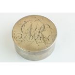 White metal circular pill box, engraved initials to the lid, diameter approx 5.5cm Provenance: