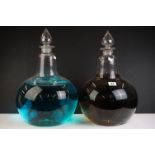Pair of 19th century shop display large scent or apothecary bottles, bulbous form with elongated