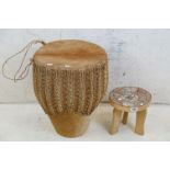 African cowhide bongo drum with twine fastenings, 47cm high, together with a small African