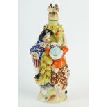 Girl in Swing scent bottle, Flower pickers: boy, girl and dog, the stopper modelled as two love
