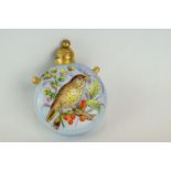 Circular scent bottle with twin gilt handles and gilt stopper, the body with hand painted thrush and