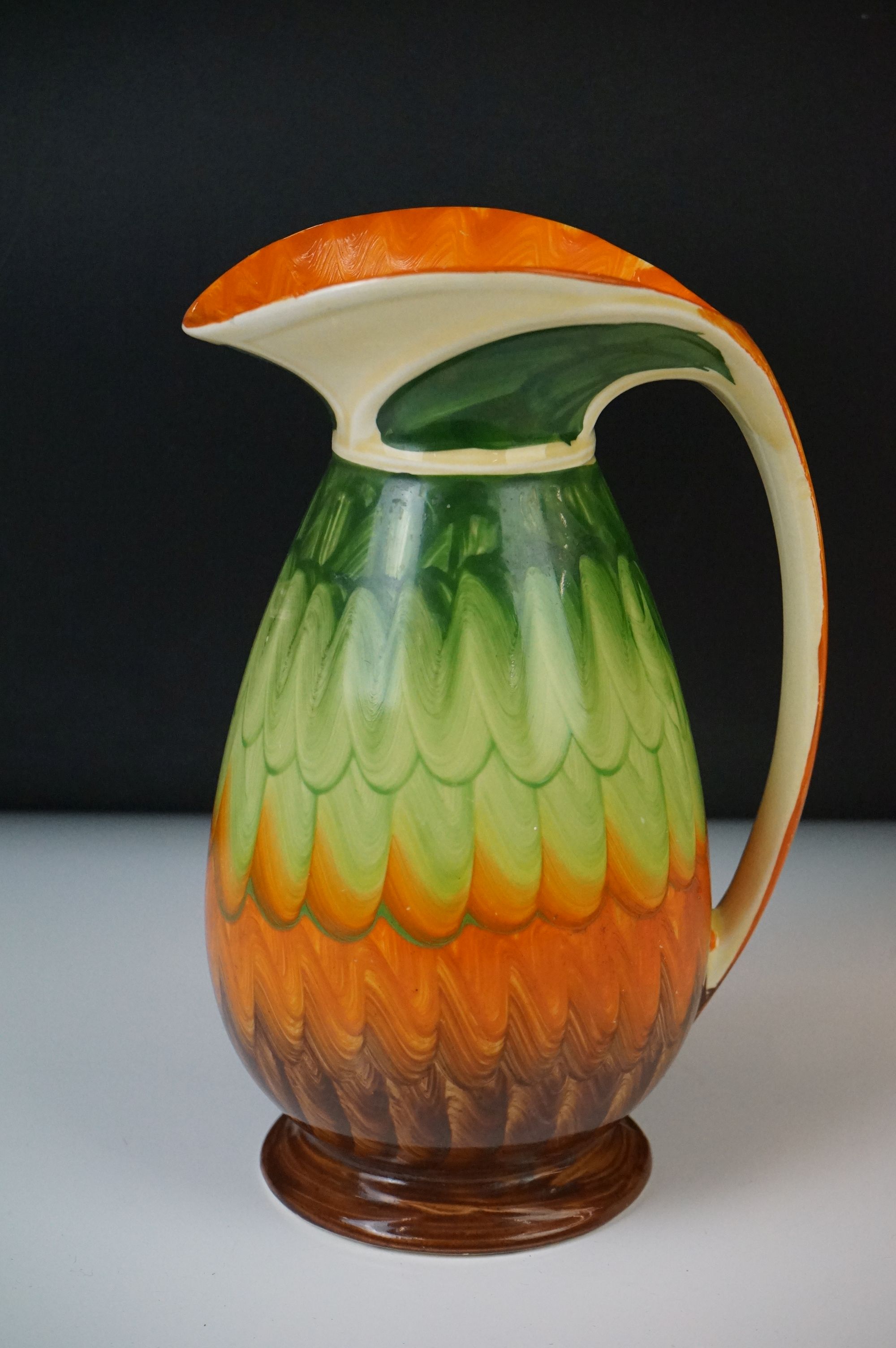 Four Myott, Son & Co hand painted Art Deco footed jugs, decorated with colourful floral, foliate and - Image 6 of 21