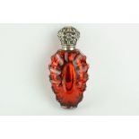 19th century red mercury glass scent bottle, white metal hinged lid with repoussé decoration,