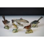 Four Beswick porcelain bird figures to include Grey Wagtail (1041), Wren (993), Whitethroat (2106)