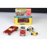 Boxed Corgi 341 Mini Marcos GT 850 diecast model in metallic red (a few spots of paint loss and