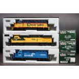 Three boxed Kato HO gauge locomotives to include 37-6323 Conrail #6324, 37-1310 CNW Operation