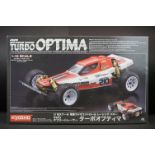 Boxed Kyosho 1/10 R/C 4WD Off Road Racer Turbo Optima radio control car, with instructions