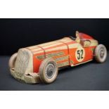 Tinplate racing car, cream and red, racing number 52, with a clockwork motor, length approx. 38cm