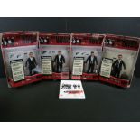 Four carded Mezco Reservoir Dogs figures to include Mr White, Mr Pink, Mr Orange & Mr Blonde,