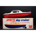 Boxed Sutcliffe tinplate Sprite Day Cruiser clockwork model in red & white with key, a few rusty