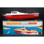 Boxed Sutcliffe Model Commodore clockwork Cruiser metal model in red & white, complete with