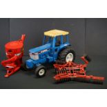 ERTL Ford TW-5 diecast tractor model (missing exhaust), plus an ERTL International diecast & plastic