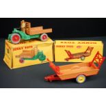 Two boxed Dinky diecast models to include 342 Motocart with driver and 320 Harvest Trailer, a few