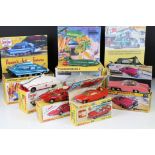 Eight TV related Dinky diecast models all in reproduction boxes/display stands and showing