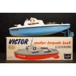 Boxed Sutcliffe Clockwork Victor Motor Torpedo Boat tinplate model in pale blue & white, complete